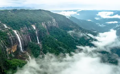 Seven Sisters Falls above a sea of clouds near Mawsmai