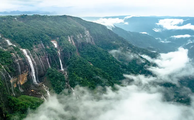 Seven Sisters Falls above a sea of clouds near Mawsmai